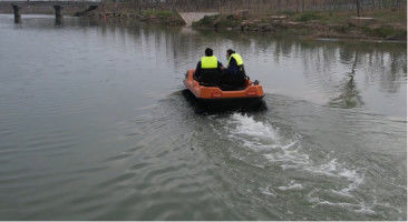 All terrain amphibious vehicle equipped with location positioning function as a tow truck